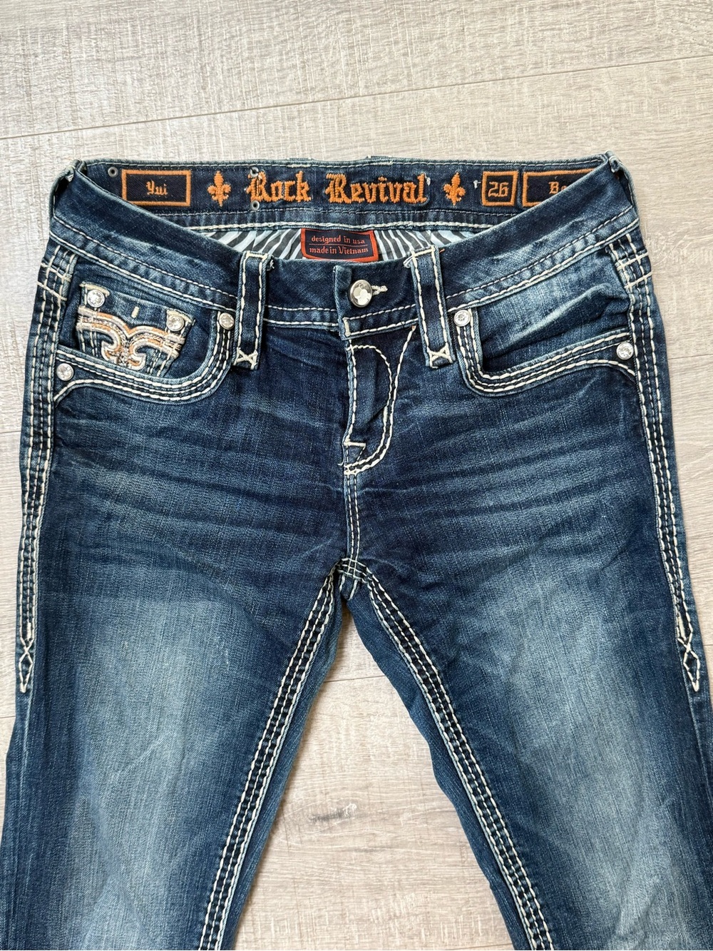 Rock Revival Women's Blue Faded Bootcut Denim Jeans with Embroidered Pockets